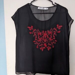 Black Boxy Blouse with Red Embellishments